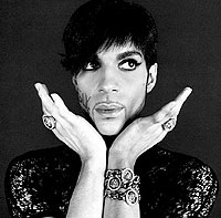 Prince så på kontrakten med Warner som en slavekontrakt. Her har han skrevet inn "Slave" på kinnet.