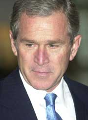 George W. Bush har skrevet under loven, selv om den inneholder problematiske formuleringer om Jerusalem. (Foto: Scanpix/AP)