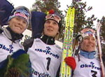 Skari på toppen av seierspallen, med Gjermundshaug Pedersen og Moen på hver sin side