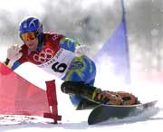 Snøbrett kom på OL-programmet i 1998 - her svenske Richard Richardsson i aksjon i Salt Lake. 