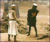 "A scratch?! But your arm's off!" - "No, it isn't!" (fra "The Holy Grail")