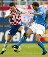 Kroatias Davor Vugrinec i kamp med Italias Cristiano Zanetti. Foto: Ian Waldie/reuters