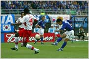 RETT PÅ: Morishima får kjenne på ballen og sender den i mål (Foto: Allsport).
