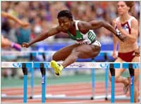 Eks-nigerianske Glory Alozie løper for Spania og er favoritt på 100 meter hekk. (Foto: Allsport)