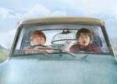 Ronny Wiltersen (Rupert Grint), snøuglen Hedvig og Harry Potter (Daniel Radcliffe)