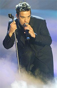 Robbie Williams kommer for å synge for Fredrik Skavland og det norske folk. Foto: Reuters / SCANPIX.