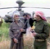 En bonde skal ha skutt ned helikopteret med gevær. Bilde fra irakisk fjernsyn. 