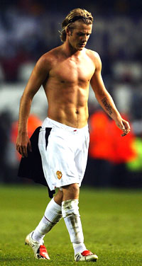 - Jeg legger heller opp enn å forlate Manchester United, sier David Beckham (Foto: Getty Images)