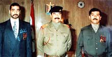 Arkivfoto av Saddam Hussein og sønnene Qusay og Uday.