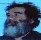 Saddam Hussein slik han så ut da han ble pågrepet lørdag. (Foto: Scanpix)