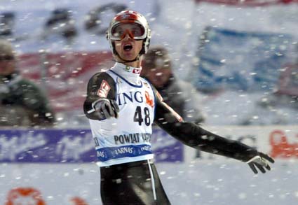 Men så snødde seieren bort. Ljøkelsøy i 2.hoppet. (Foto: P.Andrews, Reuters) Men så snødde seieren bort. Ljøkelsøy i 2.hoppet. (Foto: P.Andrews, Reuters)