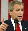 President George W. Bush mister oppslutning.