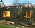 Driftsbygningen på Sæther Gård i Moelv brant ned til grunnen sommeren 2001.