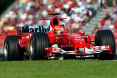 Michael Schumacher tok sin fjerde strake seier på Imolabanen. (Foto: AP/Scanpix)