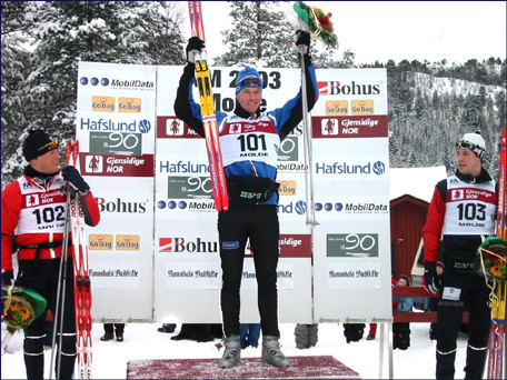 Isfjordingen Hvard Bjerkeli p pallen under ski-NM 2003 p Skaret.  Foto: Gunnar Sandvik