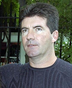 Simon Cowell har flere ganger vist at han er den verste sluggeren til å rakke ned på talenter i American Idol. Foto: AP Photo / Julie Jacobson. Simon Cowell har flere ganger vist at han er den verste sluggeren til å rakke ned på talenter i American Idol. Foto: AP Photo / Julie Jacobson.