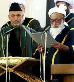 President Hamid Karzai avlegger presidenteden.(Foto:AFP/Shah Marai)