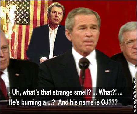 President Bush ble distrahert av et opptrinn i bakgrunnen under hans tv-sendte tale til nasjonen natt til i dag. (Innsendt av Sindre L. Lorentzen)