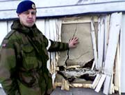 Presseoffiser Christian Chramer inspiserer skadene Presseoffiser Christian Chramer inspiserer skadene