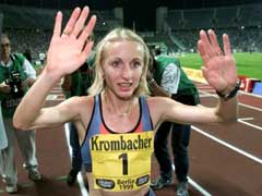Gabriela Szabo jubler etter å ha vunnet gullpotten i Berlin i 1999. (Foto: AP/Scanpix)
