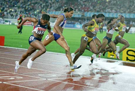Lauryn Williams (nærmest) vant 100 meter. (Foto: Reuters/Scanpix)