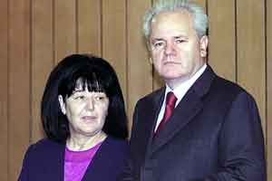 Slobodan Milosevic og hans kone Mira Markovic. Foto: Srdjan Suki, AFP 