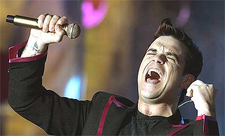 Robbie Williams er på soloturné for tida og fikk ikke med seg turnéstarten til gamlebandet. Foto: Scanpix.