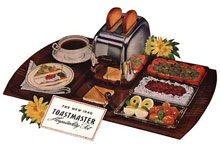 Her er Toastmaster Model 1B9 fra 1940 med tilbehørende serveringssett. 
