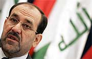 Iraks påtroppende statsminister Nuri al-Maliki jobbet onsdag videre med å danne regjering. Samtidig fortsetter volden. Foto: Reuters/Ali Haider/Pool 