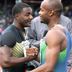 Asafa Powell (høyre) og Justin Gatlin (venstre) (Foto: AP/ SCANPIX)